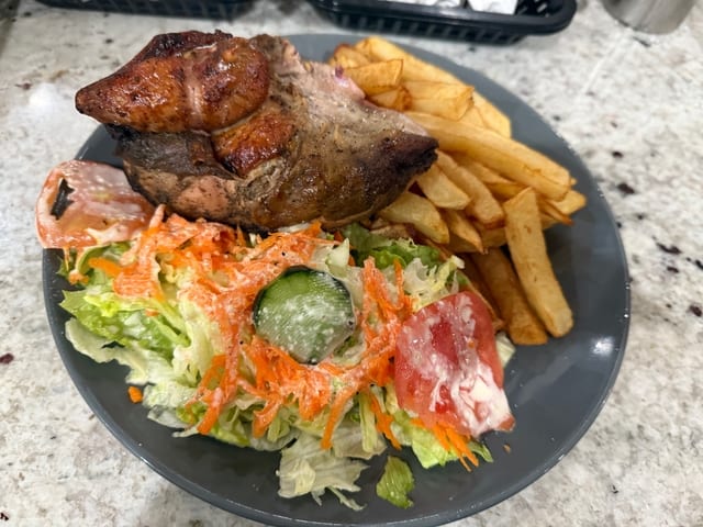 1/2 Pollo (1/2 chicken).